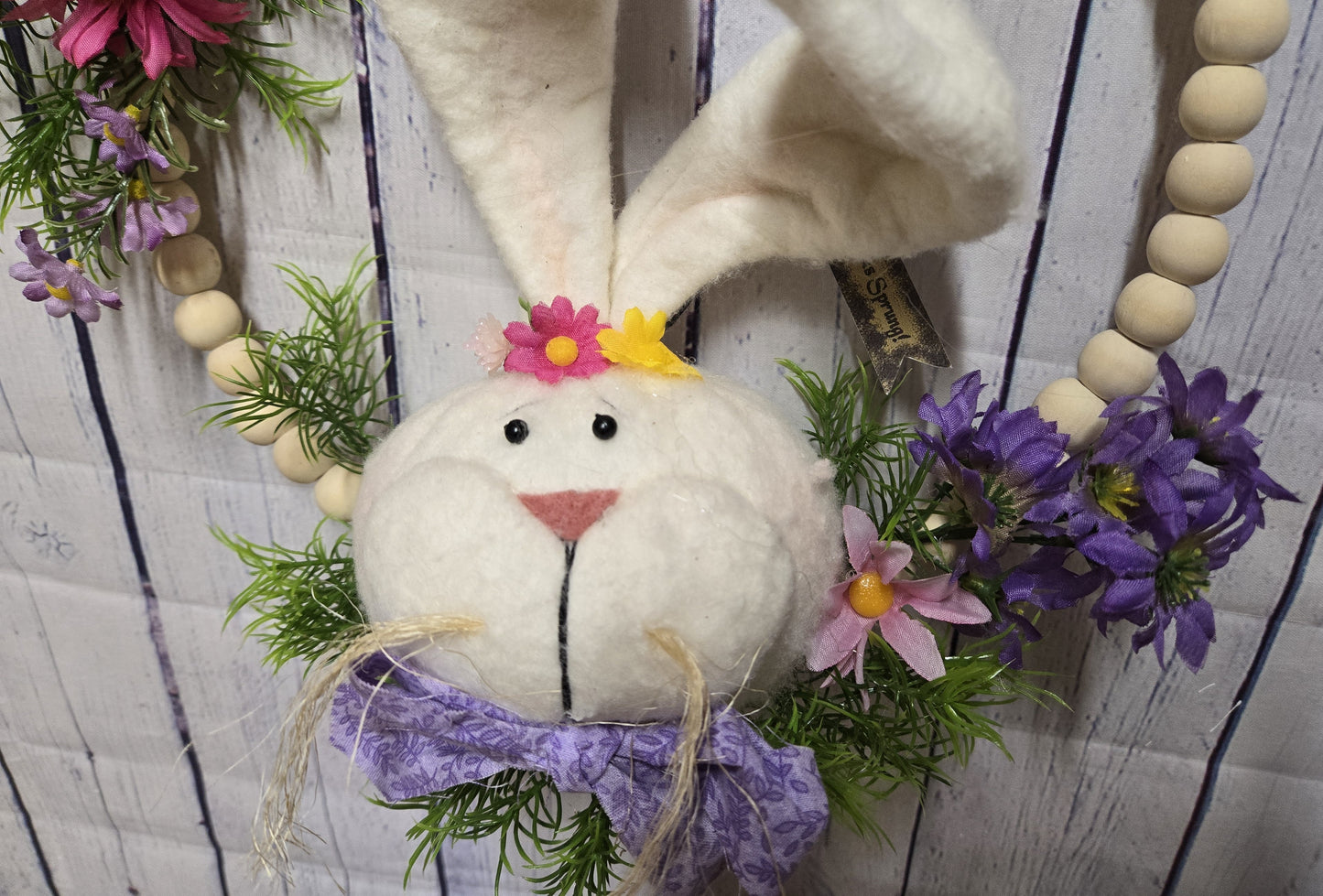 12 Inch Boho Wood Bead Easter Bunny Wreath – Modern Farmhouse Spring Door Hanger – Handmade Plush Rabbit with Floral Accents and Purple Bow