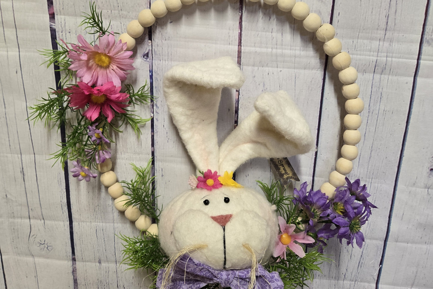 12 Inch Boho Wood Bead Easter Bunny Wreath – Modern Farmhouse Spring Door Hanger – Handmade Plush Rabbit with Floral Accents and Purple Bow