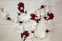 White, wine and green old fashioned Christmas tree garland.