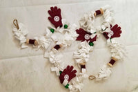 White, wine and green old fashioned Christmas tree garland.