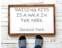 raising kids is a walk in the park. jurassic park