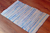 warm cream and sky blue twined rag rug