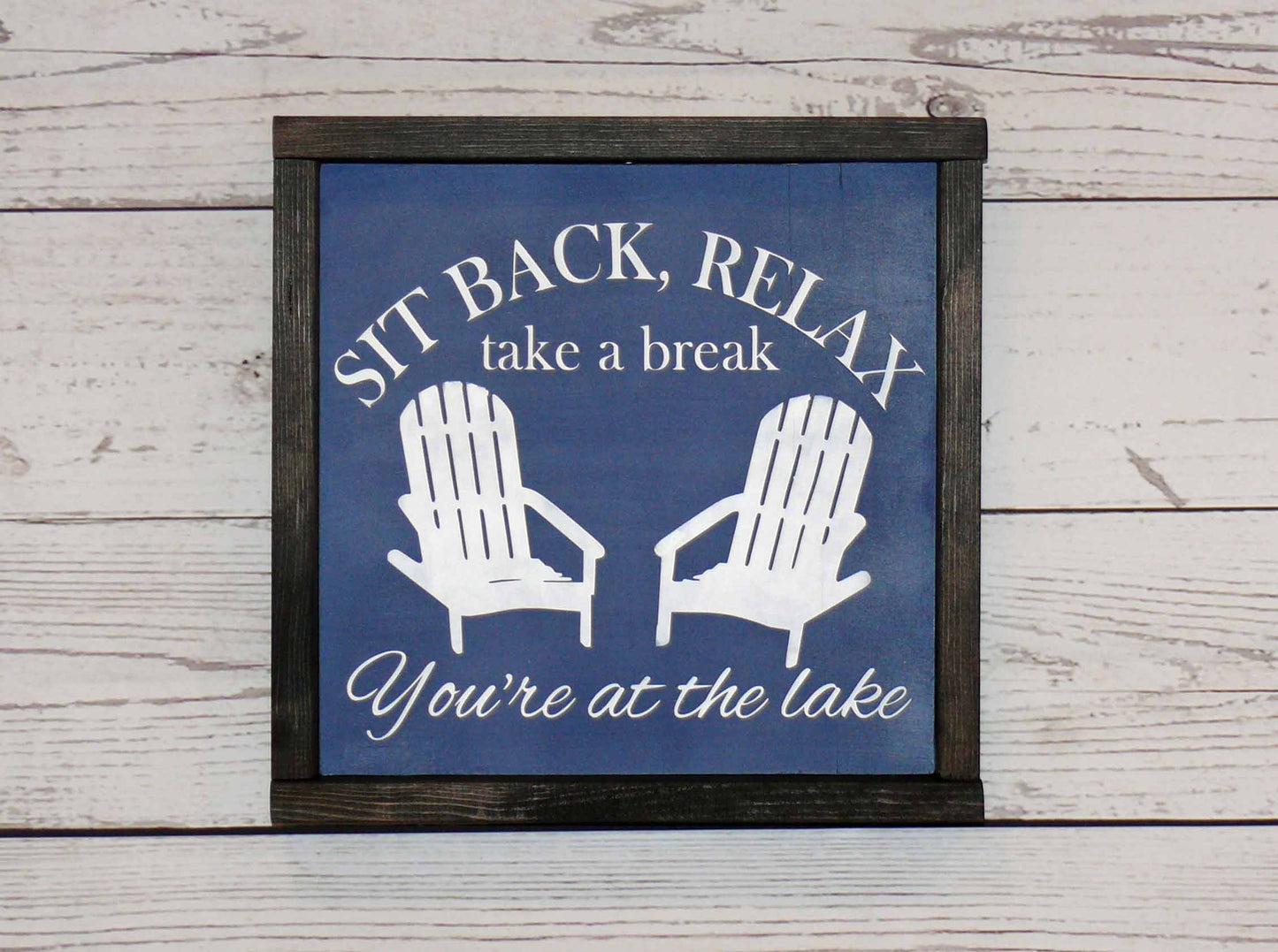 Sit back and relax at the lake sign