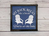 Sit back and relax at the lake sign